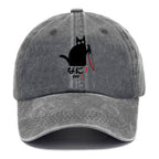 A Puzzled Cat Holding A Knife Washed Cap