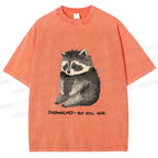 Unisex Overwhelmed Raccoon Still Here Printed Washed Tee