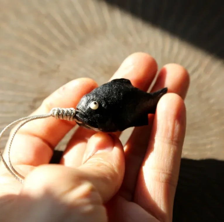 Black fish pendant