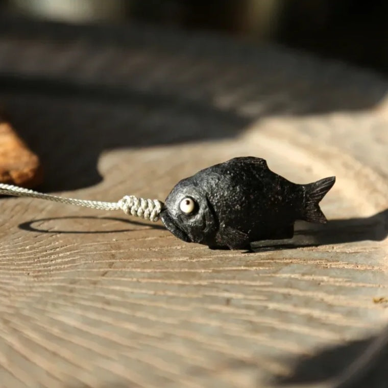 Black fish pendant