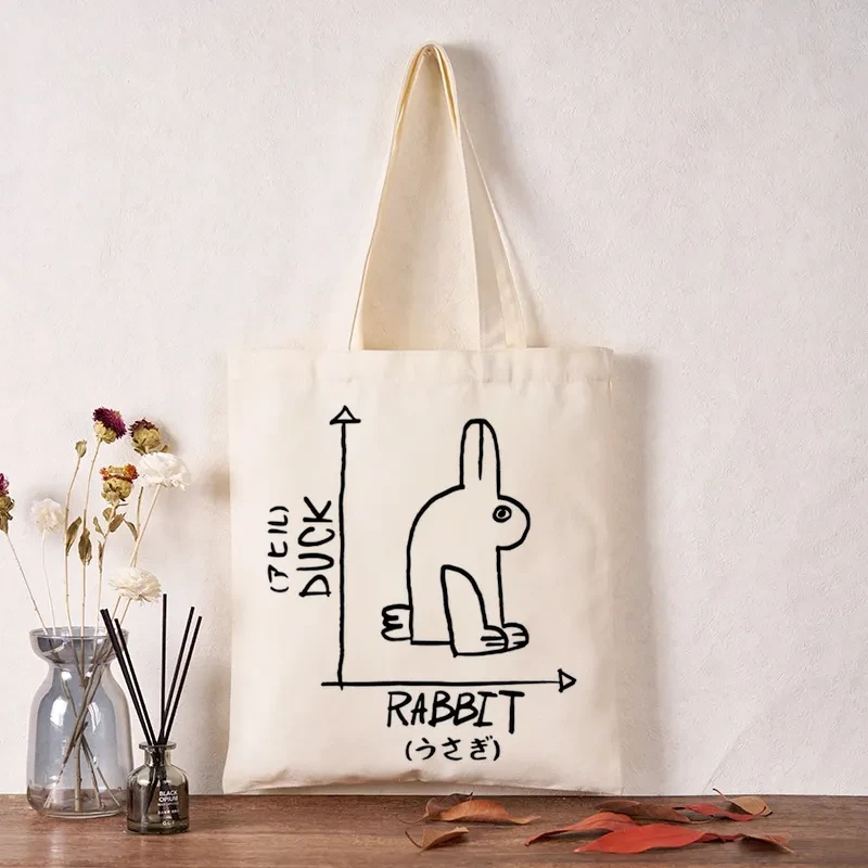 A Rabbit And A Duck Tote Bag